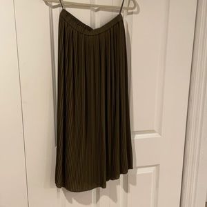 Long olive colored pleated skirt